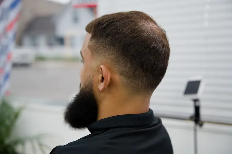 Classic side part taper by Deluxe Kutz