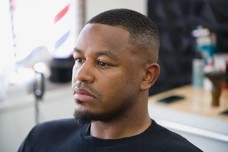 High skin fade by Deluxe Kutz